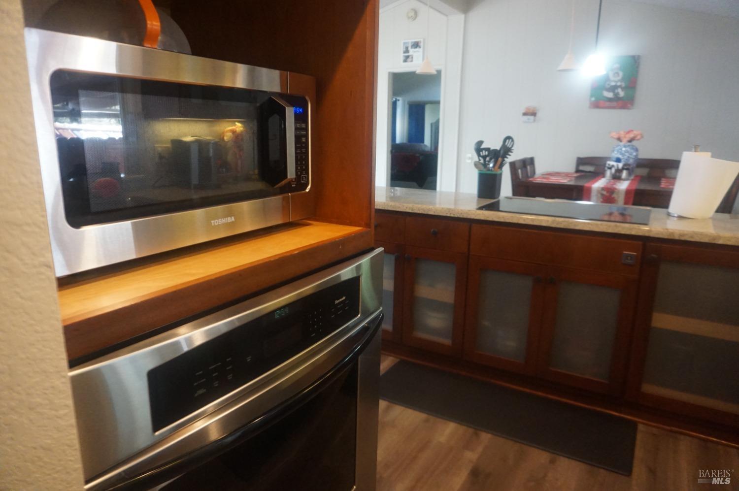 6004 Monticello Road, Unit 10 Napa, CA 94558 - Photo 19 of 41 a room with furniture and flat screen tv