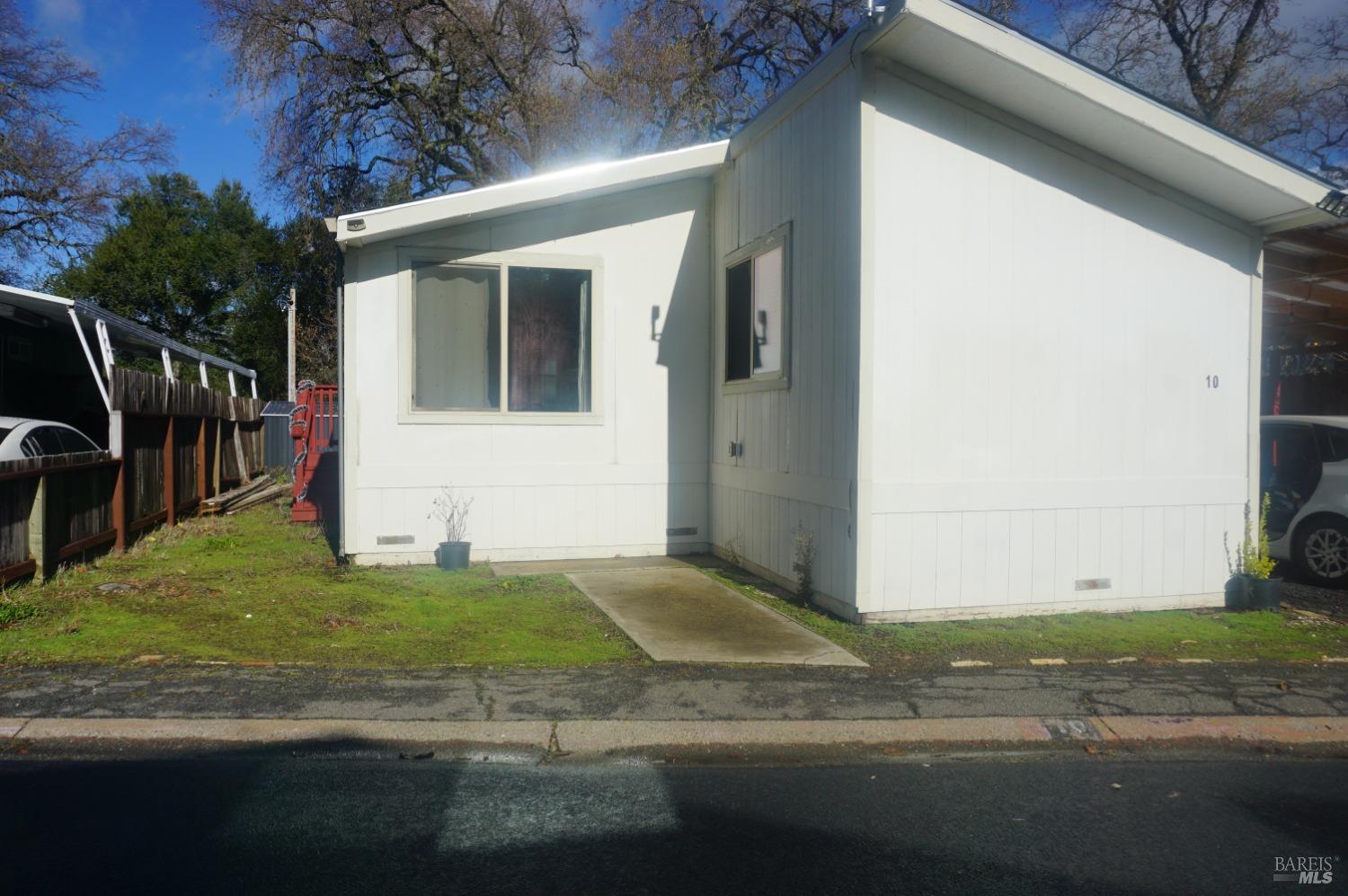 6004 Monticello Road, Unit 10 Napa, CA 94558 - Photo 2 of 41 a view of a house with a yard