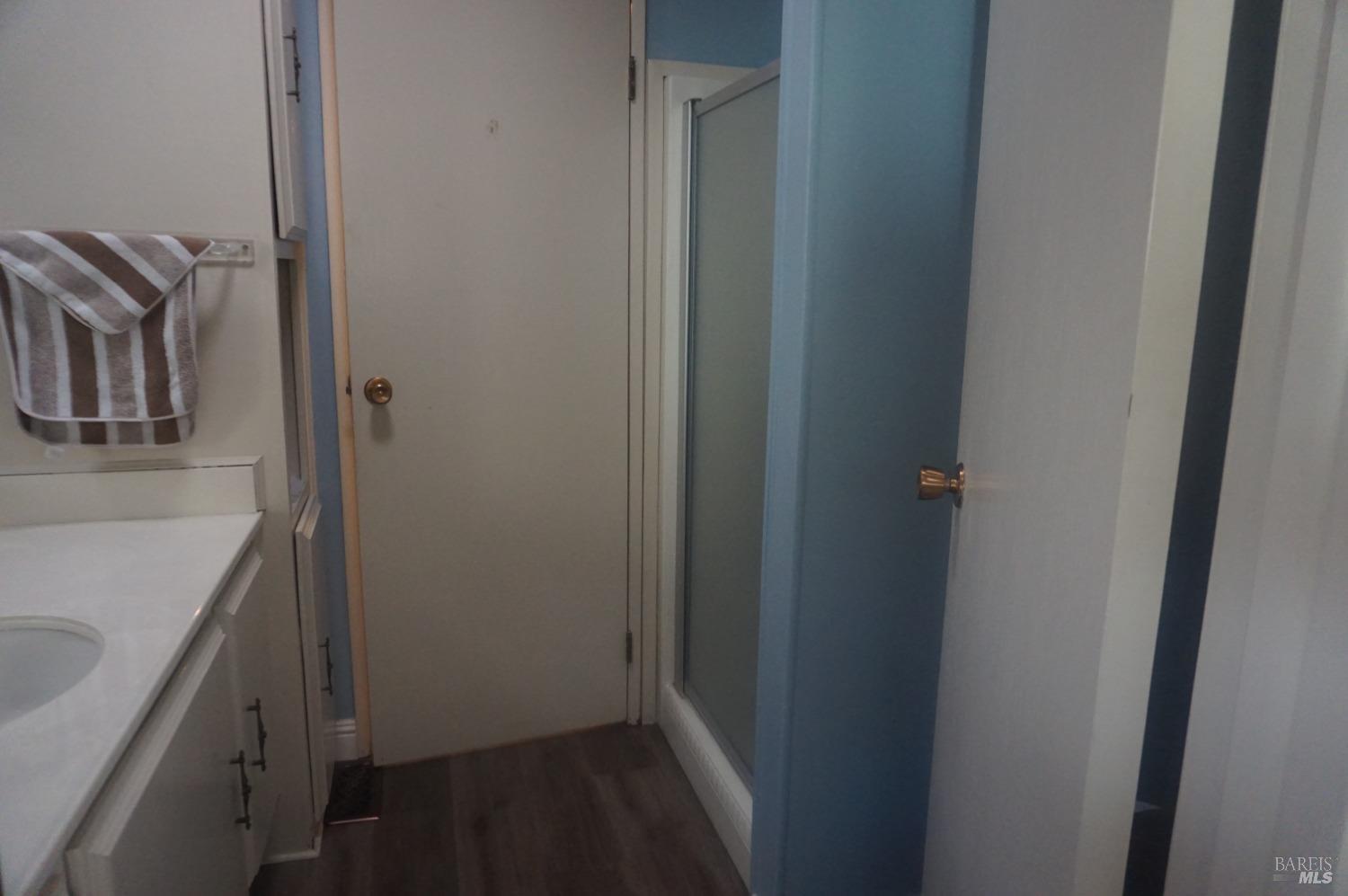 6004 Monticello Road, Unit 10 Napa, CA 94558 - Photo 27 of 41 a bathroom with a sink and a mirror