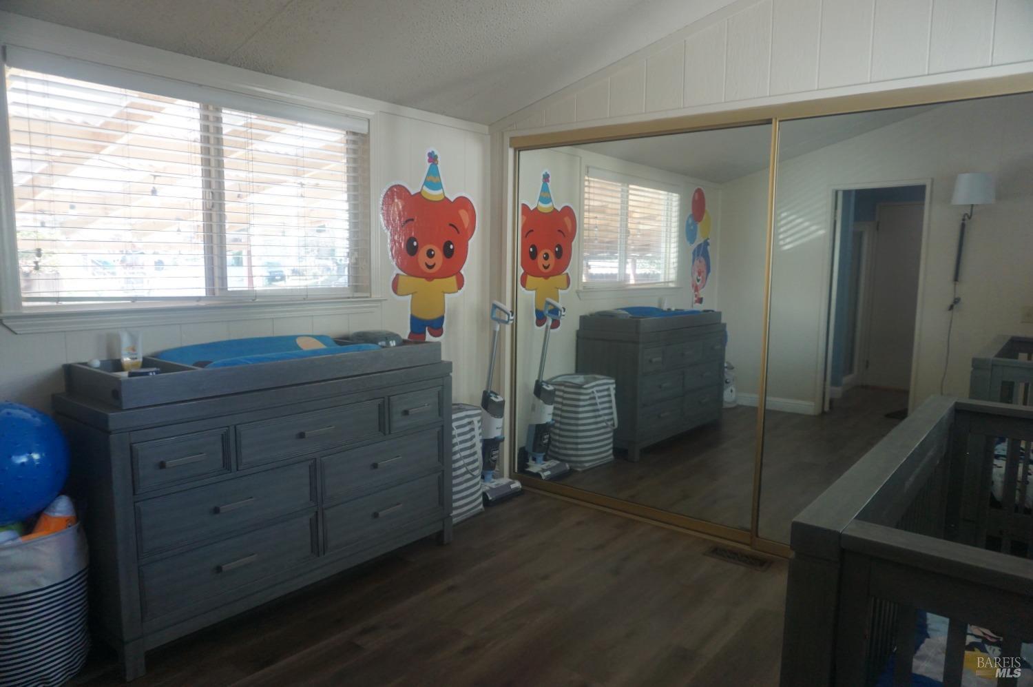 6004 Monticello Road, Unit 10 Napa, CA 94558 - Photo 29 of 41 a room with furniture and window