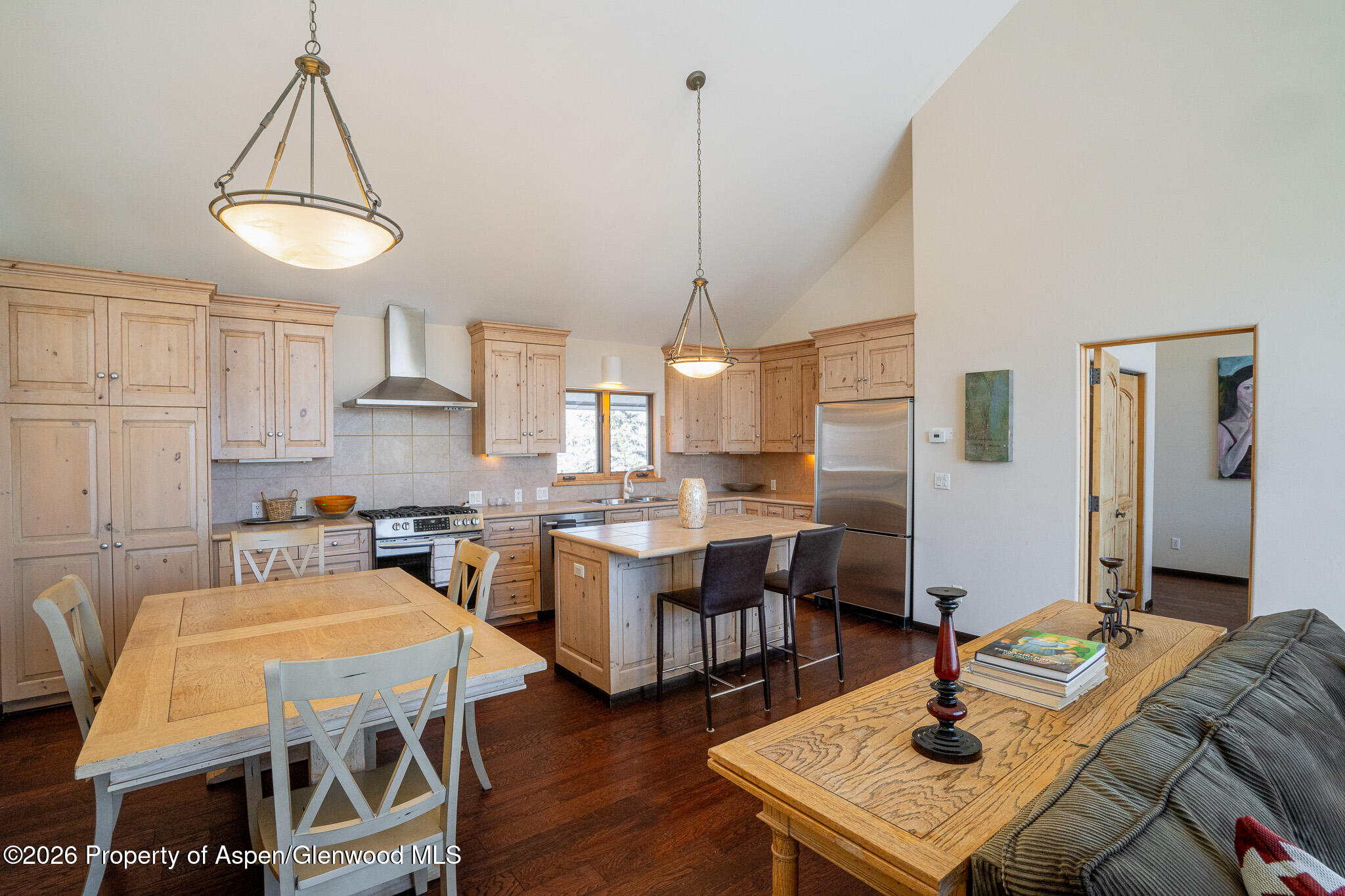 2310 Juniper Hill Road Aspen, CO 81611 - Photo 25 of 50 a view of a a dining room with furniture window and wooden floor