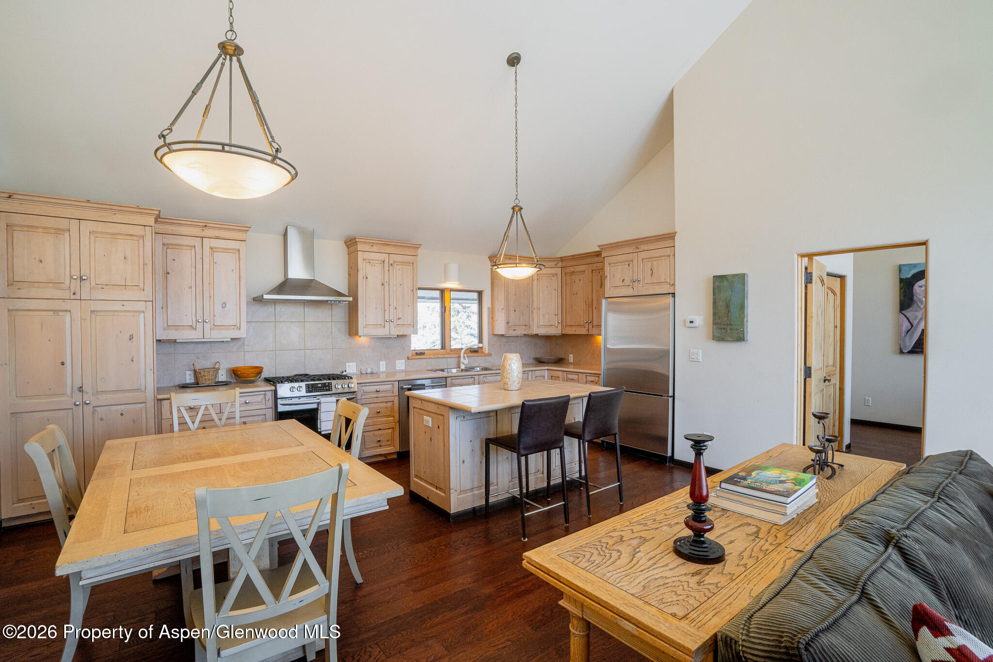 2310 Juniper Hill Road Aspen, CO 81611 - Photo 26 of 50 a view of a a dining room with furniture window and wooden floor