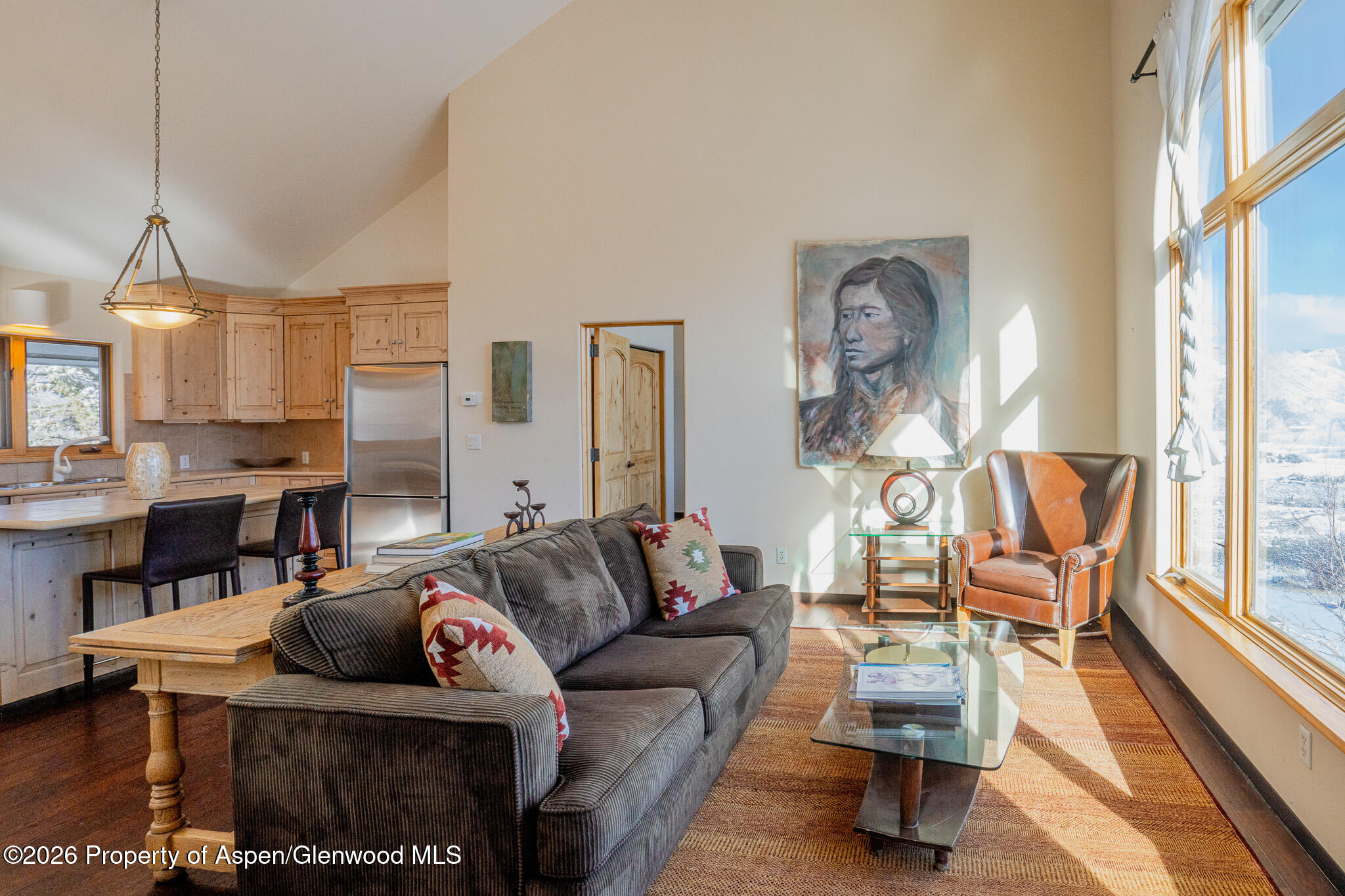 2310 Juniper Hill Road Aspen, CO 81611 - Photo 27 of 50 a living room with furniture and a large window