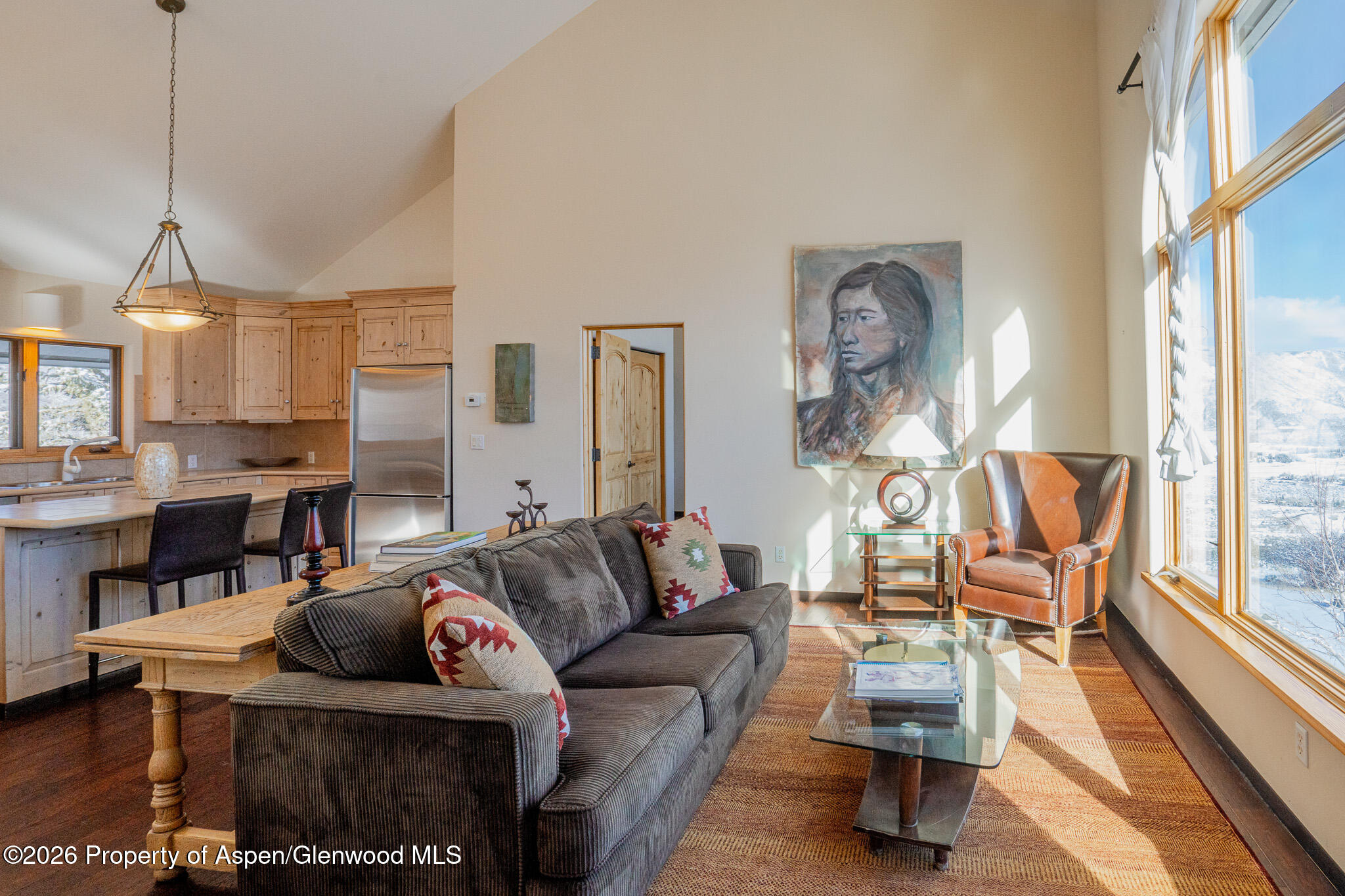 2310 Juniper Hill Road Aspen, CO 81611 - Photo 28 of 50 a living room with furniture and a large window