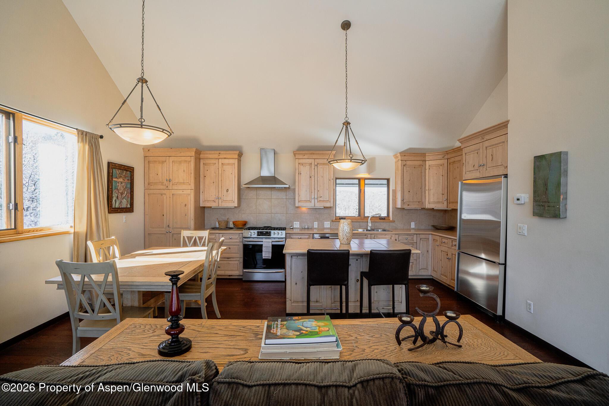 2310 Juniper Hill Road Aspen, CO 81611 - Photo 31 of 50 a living room with lots of furniture and a chandelier