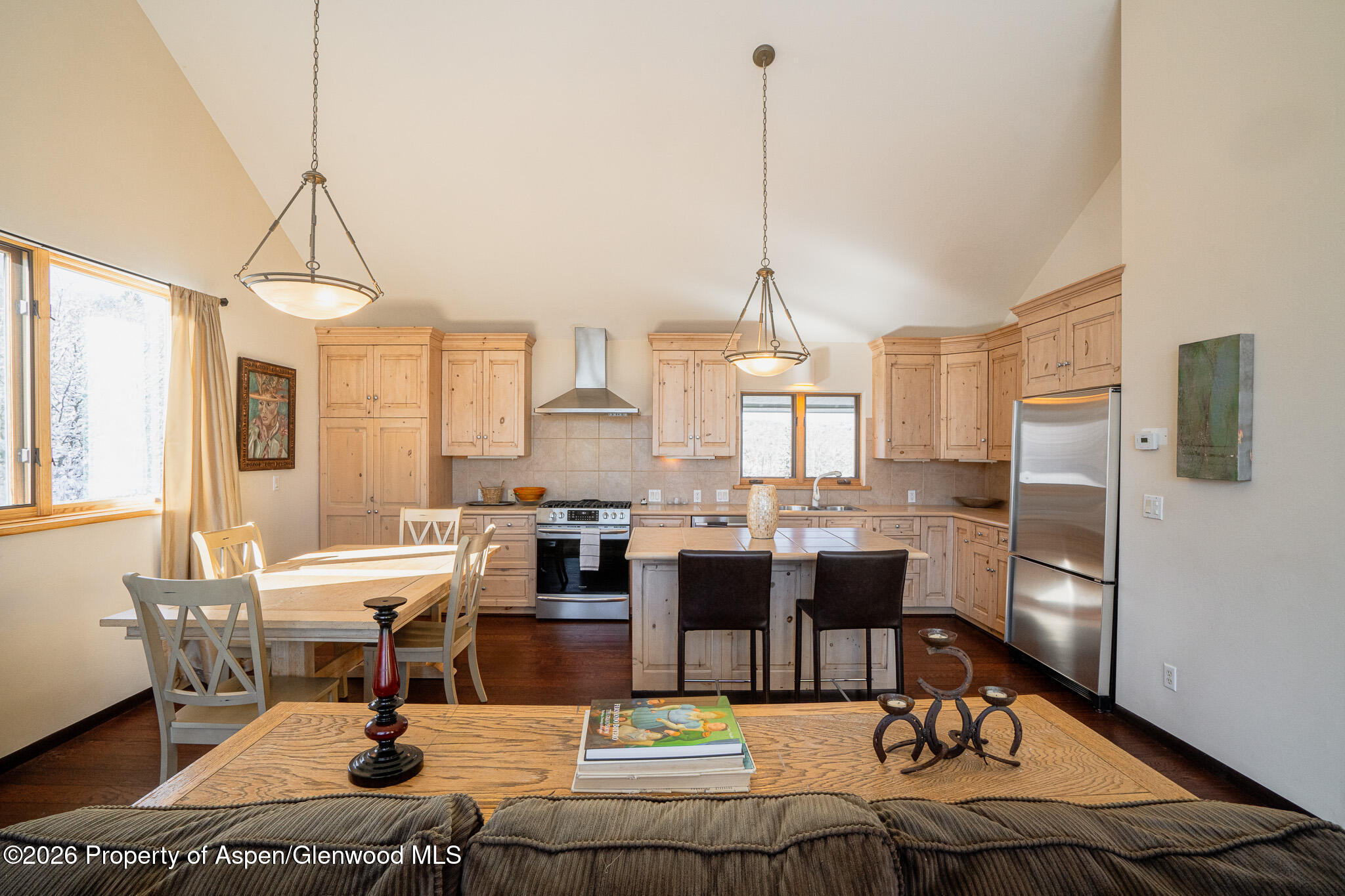 2310 Juniper Hill Road Aspen, CO 81611 - Photo 32 of 50 a view of a dining room with furniture window and wooden floor