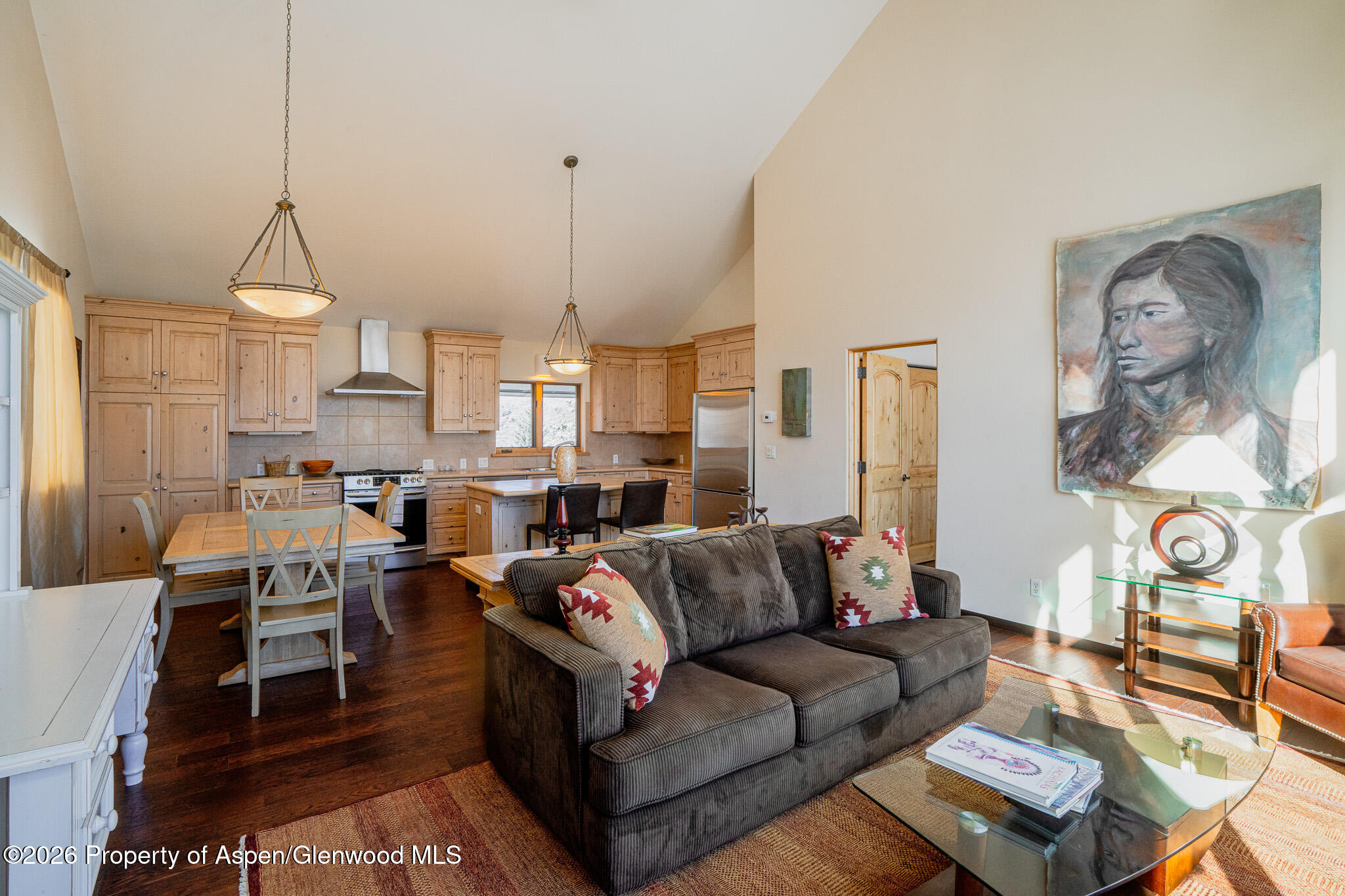 2310 Juniper Hill Road Aspen, CO 81611 - Photo 33 of 50 a living room with furniture a rug and a chandelier