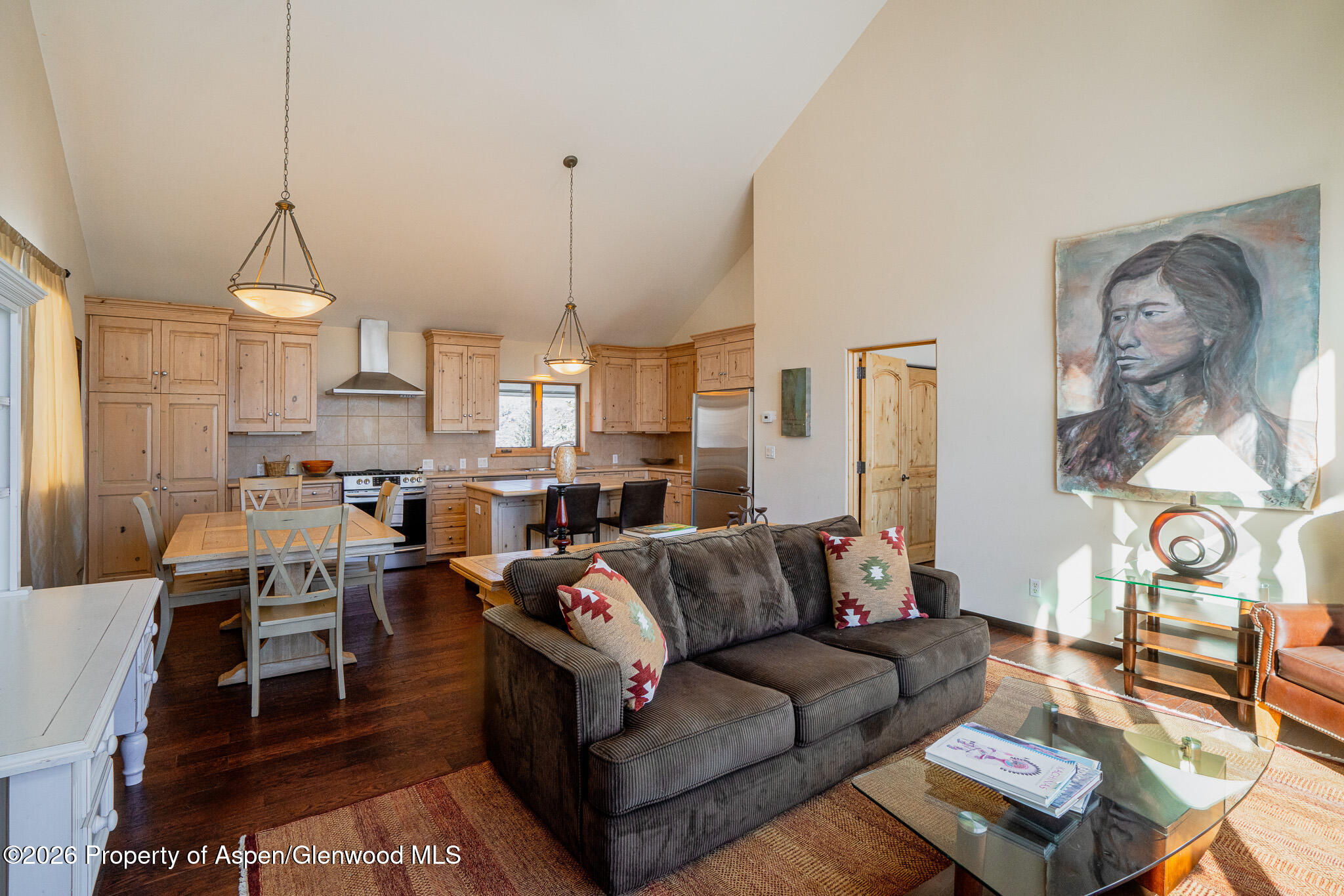 2310 Juniper Hill Road Aspen, CO 81611 - Photo 34 of 50 a living room with furniture a rug and a chandelier