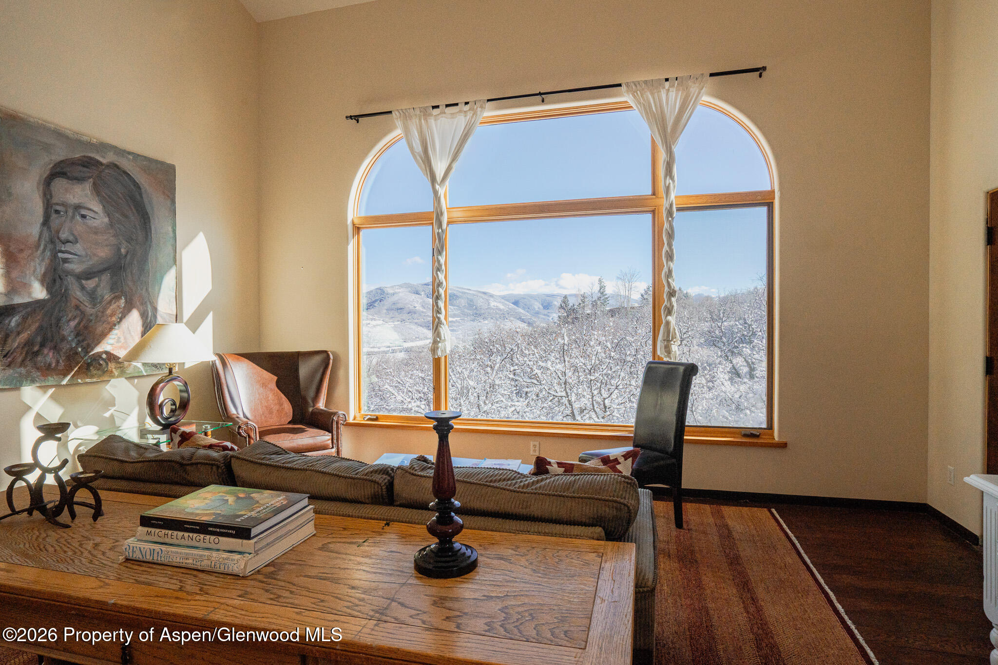 2310 Juniper Hill Road Aspen, CO 81611 - Photo 47 of 50 a view of a living room with furniture and floor to ceiling window