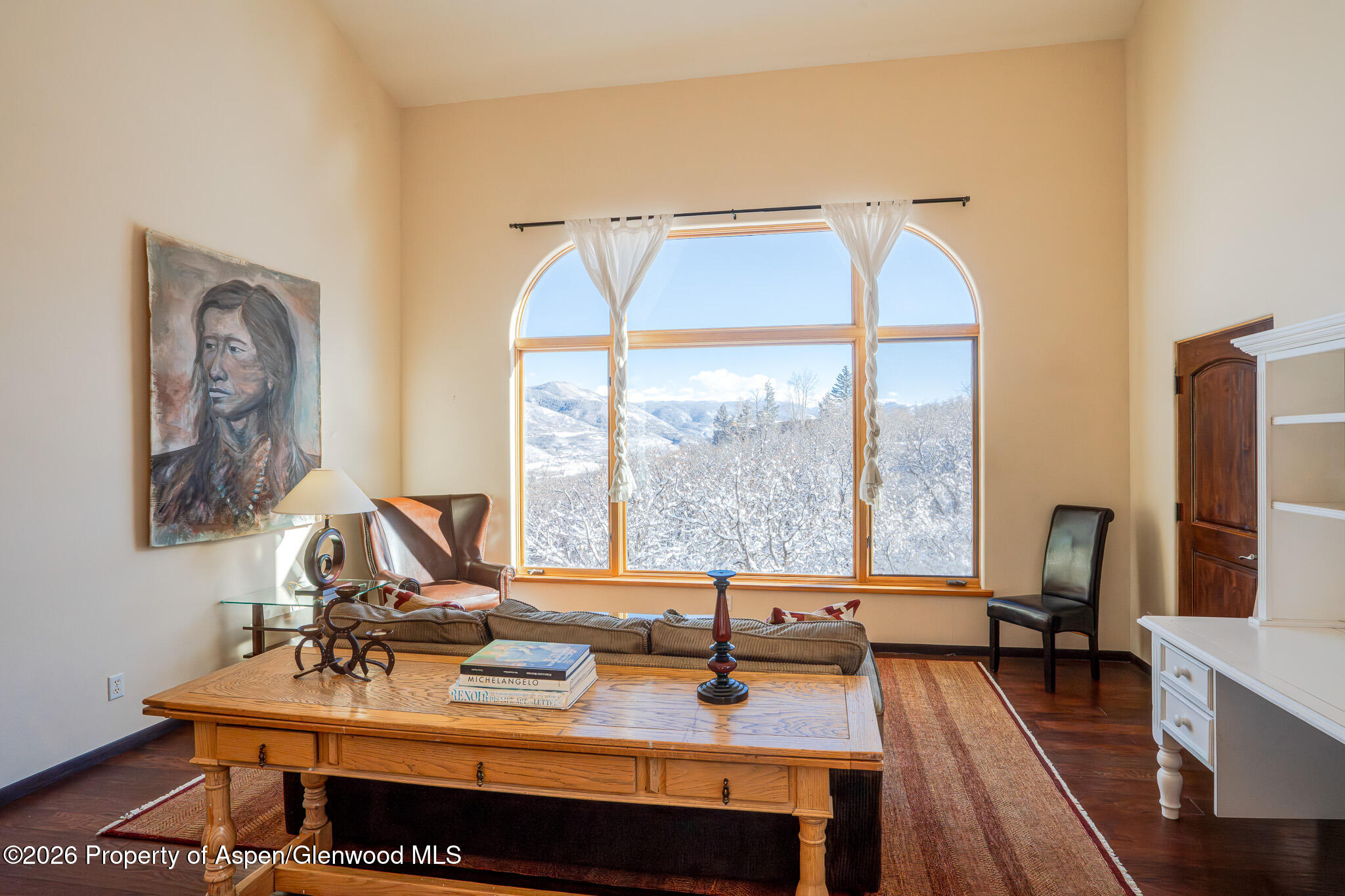 2310 Juniper Hill Road Aspen, CO 81611 - Photo 7 of 50 a view of a workspace with furniture and a window