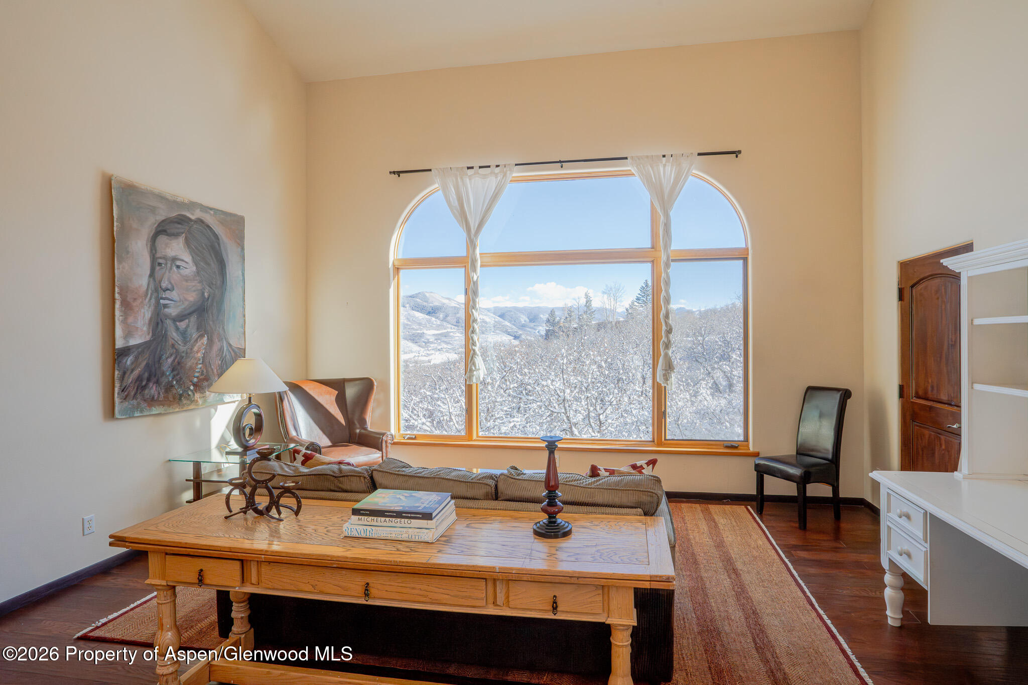 2310 Juniper Hill Road Aspen, CO 81611 - Photo 8 of 50 a view of a workspace with furniture and a window