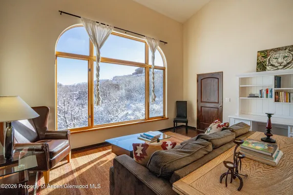 a room with furniture and a window