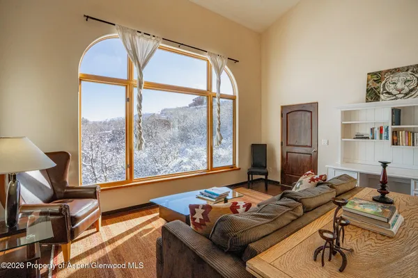 a room with furniture and a window
