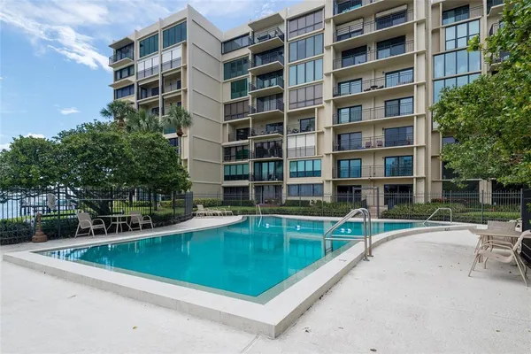 a view of a building with a swimming pool