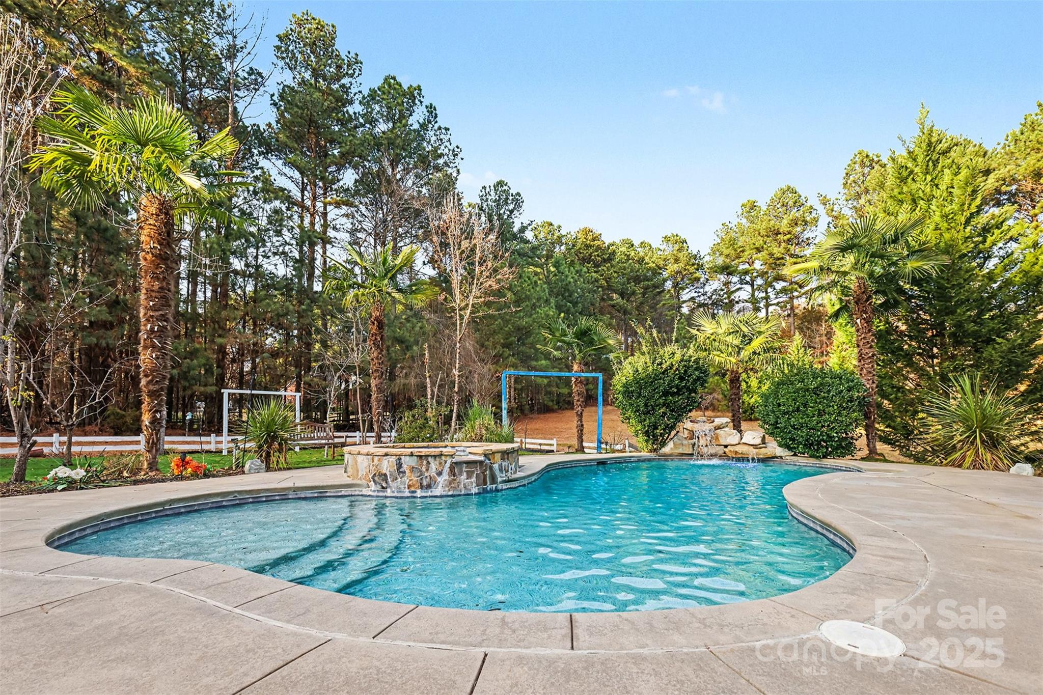 a view of a swimming pool with a patio