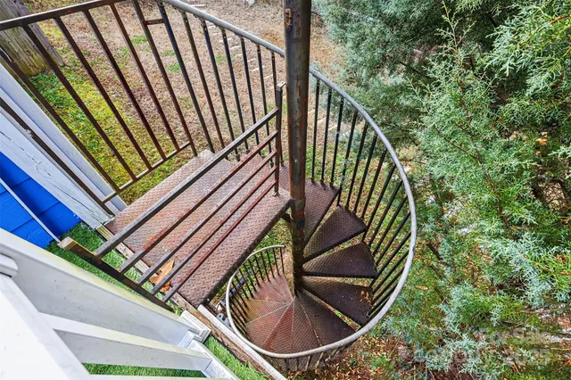 a view of a balcony with staircase