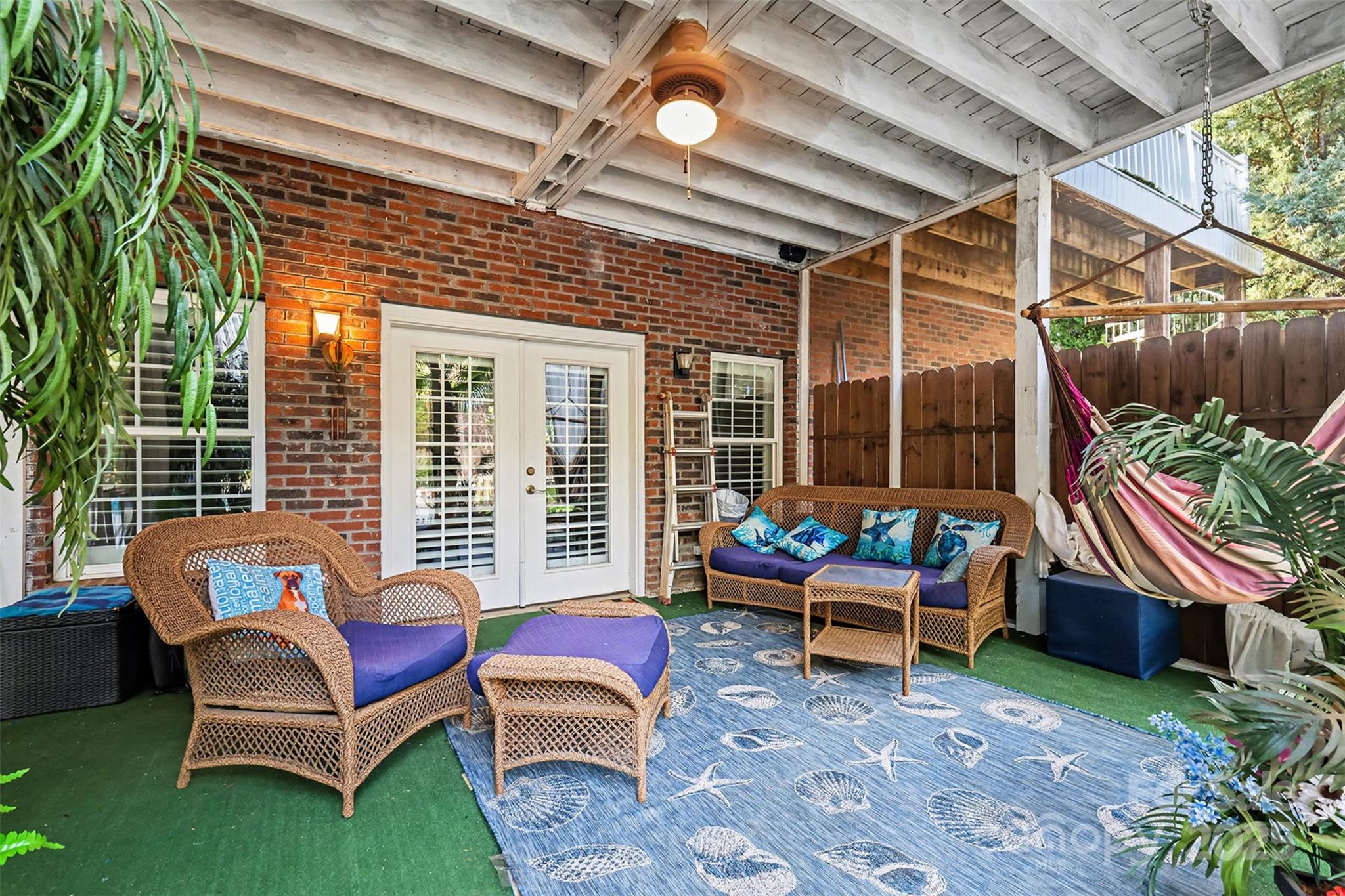 5418 Commodore Place Clover, SC 29710 - Photo 34 of 48 a outdoor living space with patio furniture and a potted plant