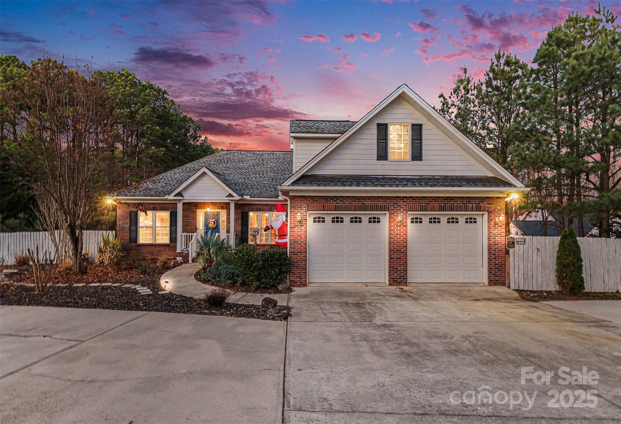 5418 Commodore Place Clover, SC 29710 - Photo 4 of 48 a front view of a house with a yard and garage