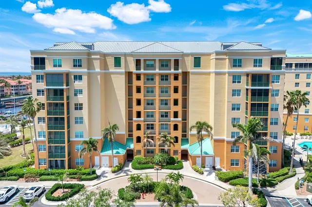 a front view of a building with a street