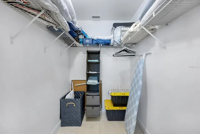a bathroom with a granite countertop sink mirror and double