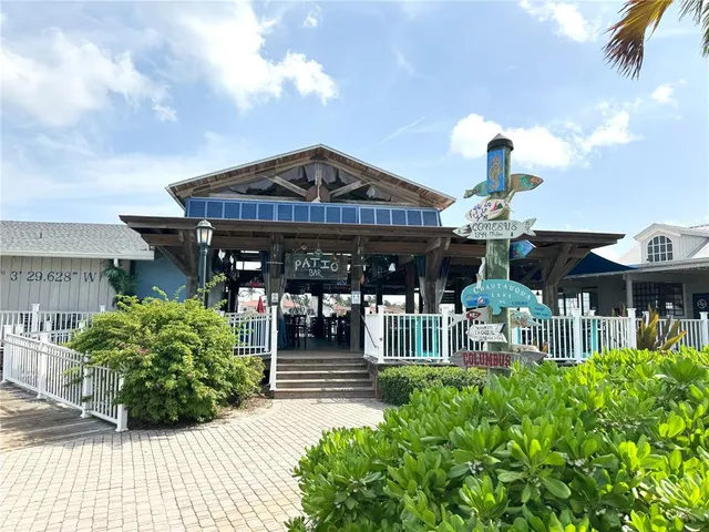 a view of a door with a street sign