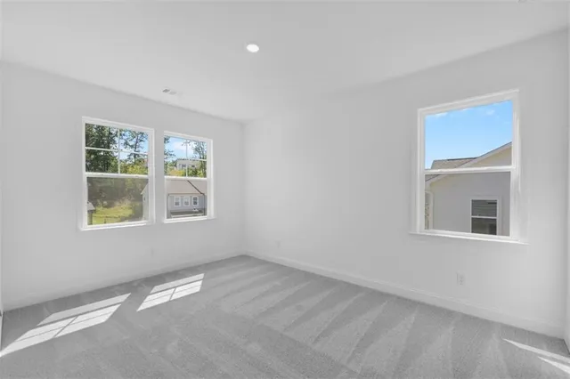 an empty room with windows