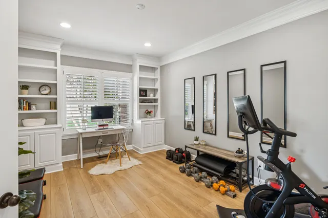 a open kitchen with stainless steel appliances granite countertop a sink stove and wooden floor