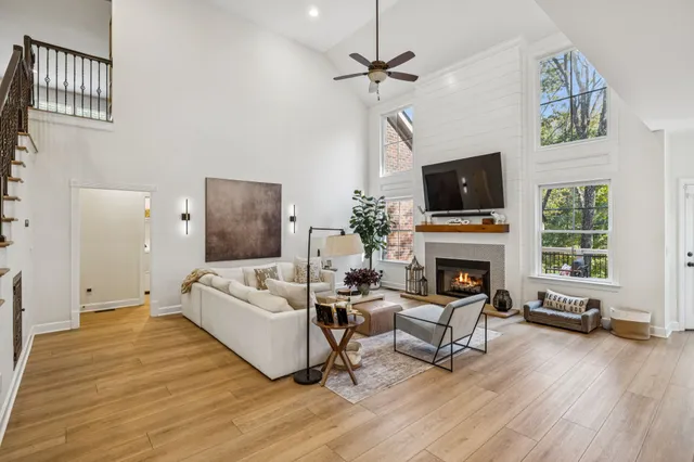 a kitchen with kitchen island granite countertop a sink stainless steel appliances and cabinets