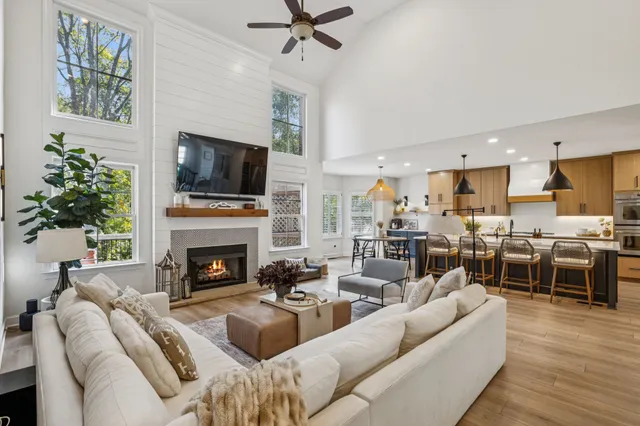 a kitchen with a sink and a large window