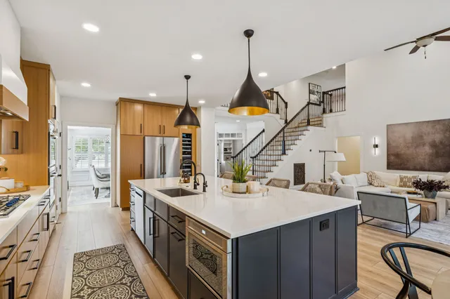 a bedroom with a large bed and a dresser