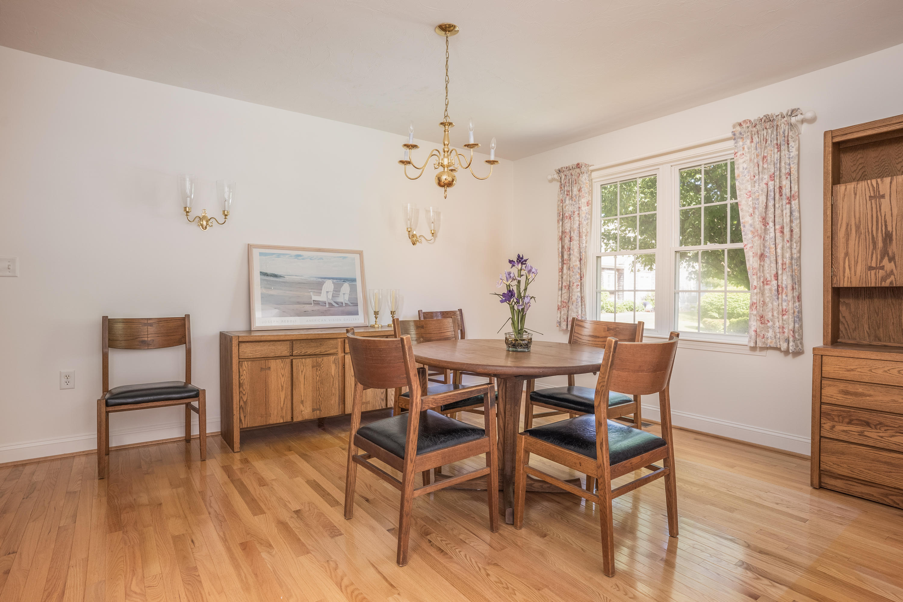 8 Stratford Ridge Mashpee, MA 02649 - Photo 4 of 23 a view of a dining room with furniture window and wooden floor