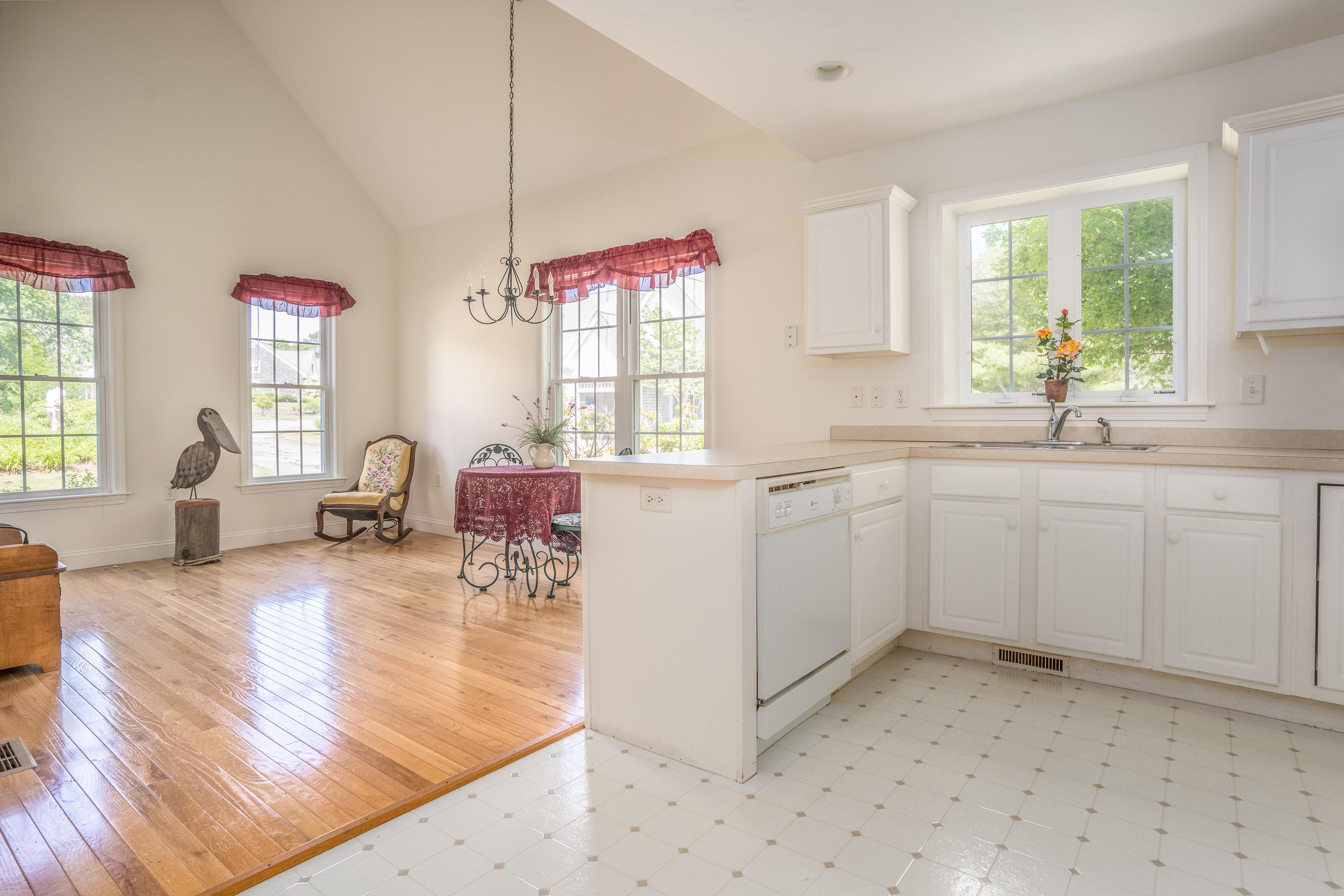 8 Stratford Ridge Mashpee, MA 02649 - Photo 6 of 23 a open kitchen with sink cabinets and window