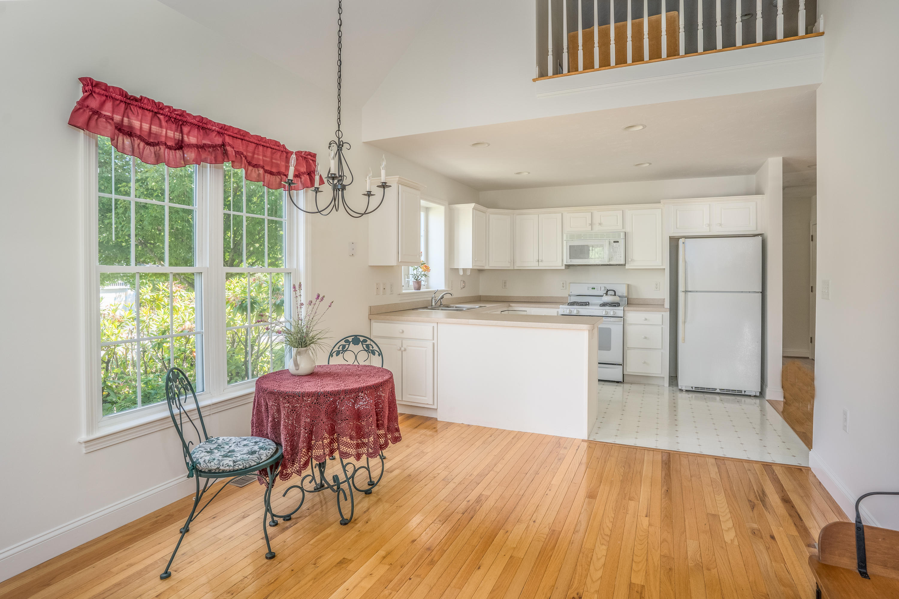 8 Stratford Ridge Mashpee, MA 02649 - Photo 8 of 23 a dining room with furniture and wooden floor