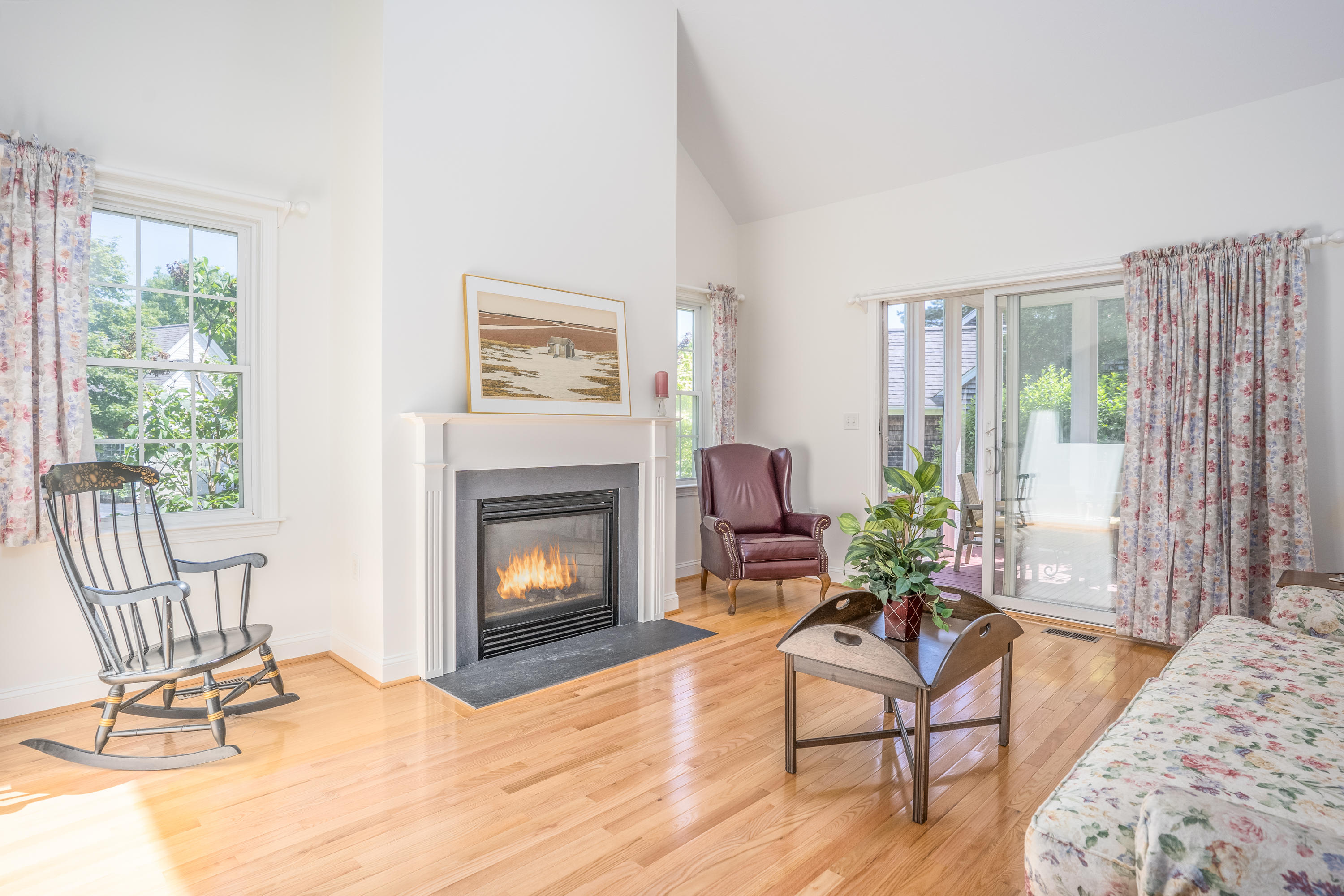 8 Stratford Ridge Mashpee, MA 02649 - Photo 10 of 23 a living room with furniture and a fireplace