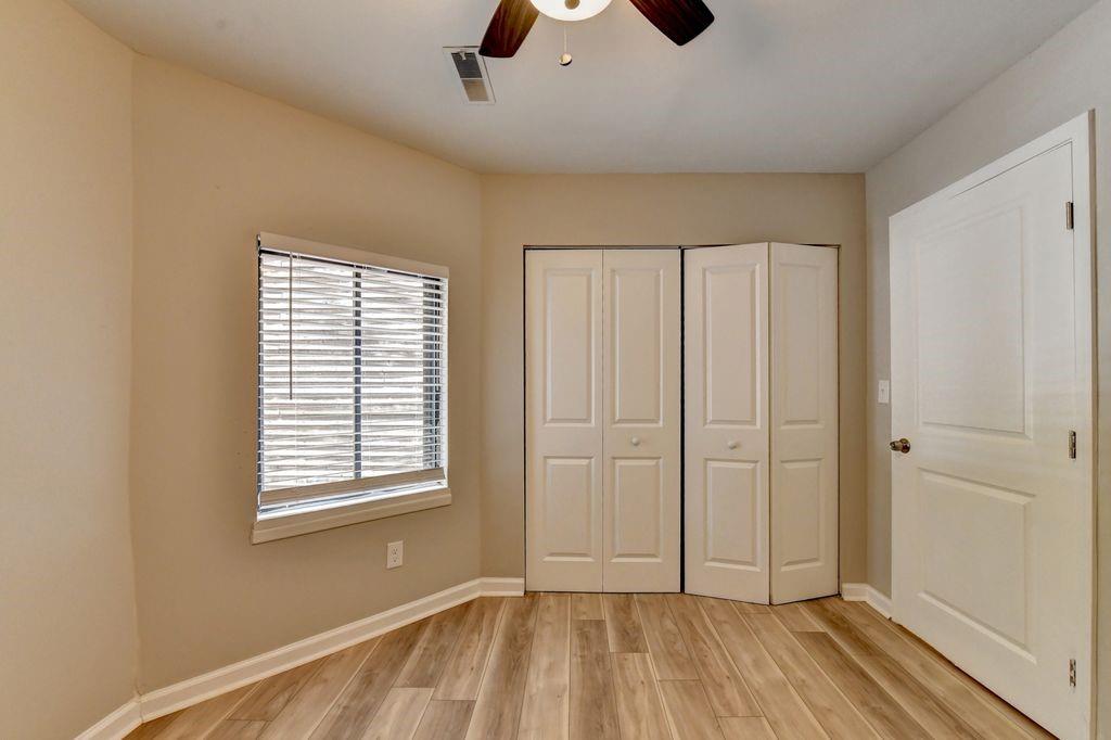 2503 Terrace Trail Decatur, GA 30035 - Photo 39 of 45 a view of an empty room with wooden floor and a window