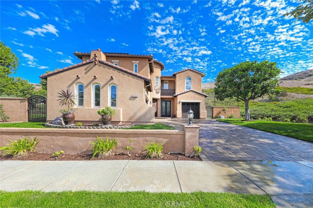6402 Camino Ventosa San Clemente, CA 92673 - Photo 1 of 67 a front view of a house with a yard and garage