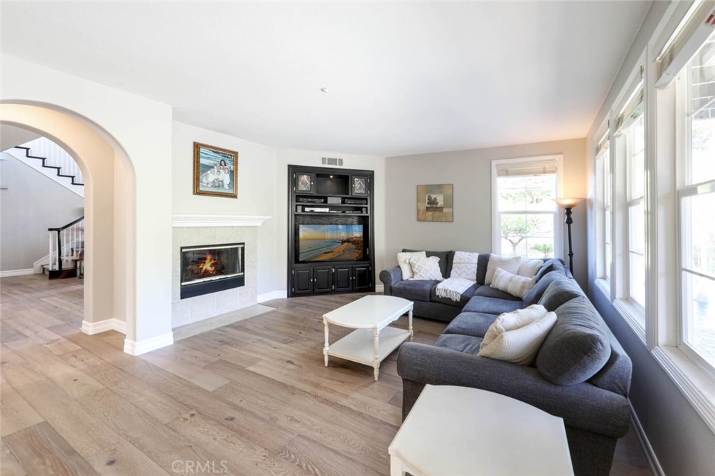 6402 Camino Ventosa San Clemente, CA 92673 - Photo 15 of 67 a living room with furniture and a fireplace