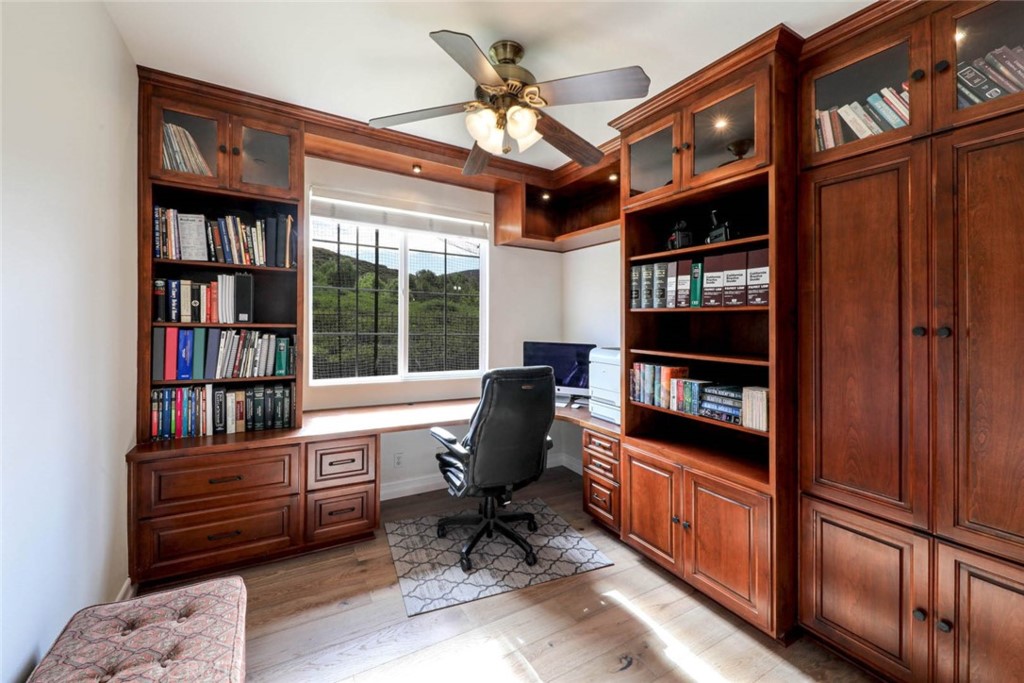 6402 Camino Ventosa San Clemente, CA 92673 - Photo 18 of 67 a living room with furniture cabinets and book shelf