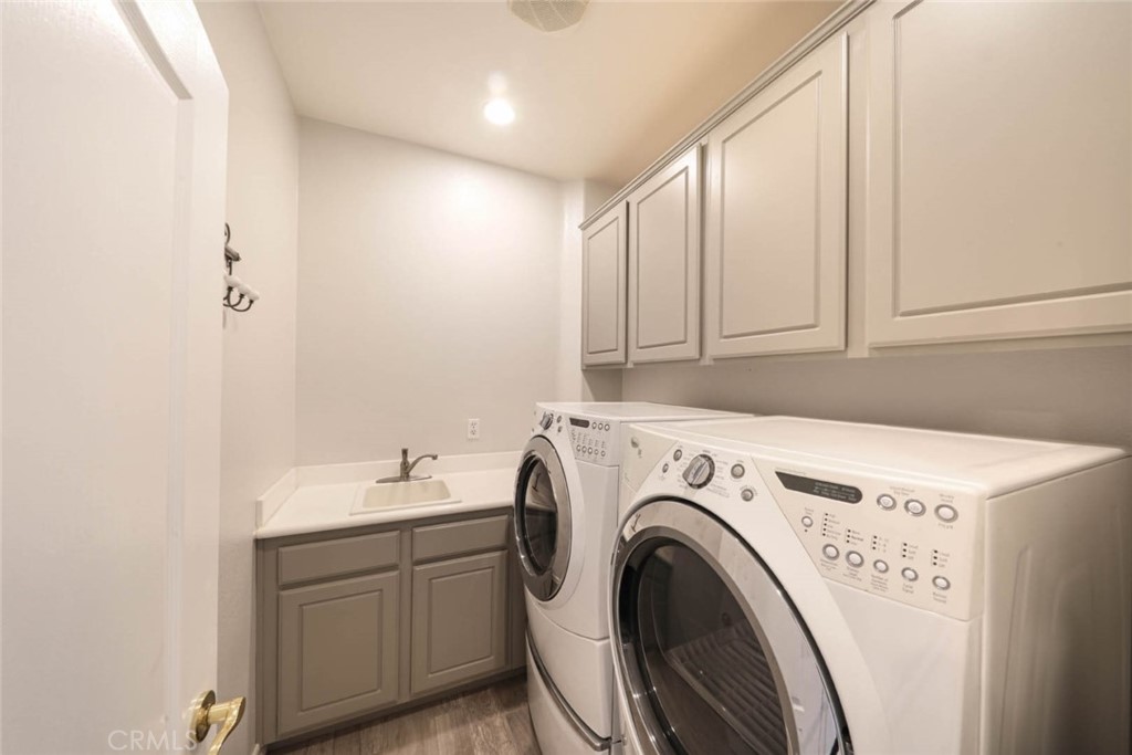 6402 Camino Ventosa San Clemente, CA 92673 - Photo 35 of 67 a utility room with dryer and washer