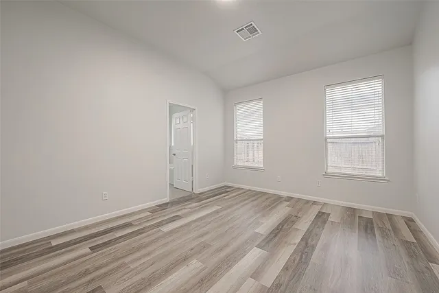 an empty room with window