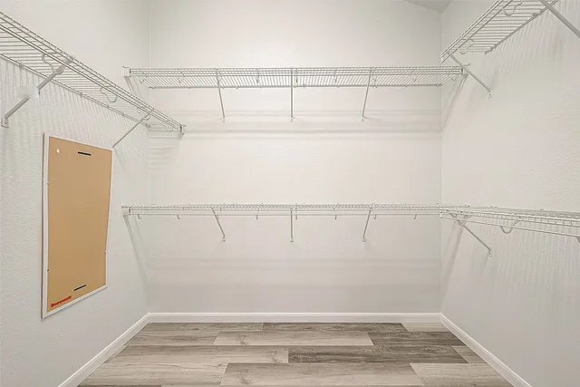 a view of a room with racks on the wall