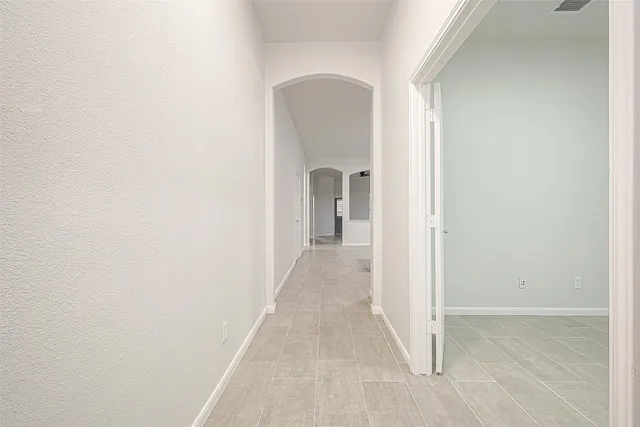 a view of a room with a hallway