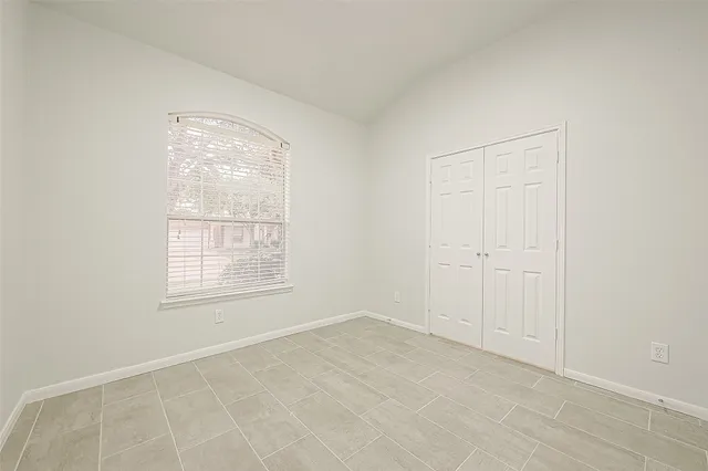 an empty room with windows