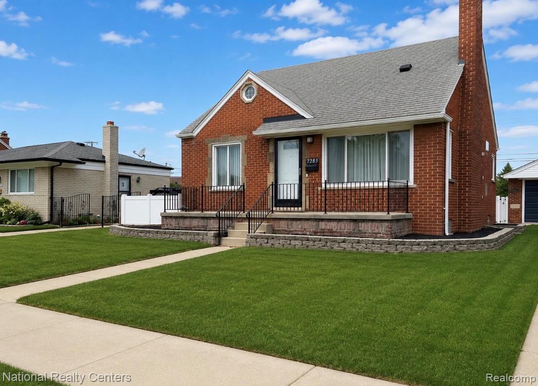 7285 Helen Street Center Line, MI 48015 - Photo 2 of 32 Brick exterior featuring a gabled roof and a prominent chimney