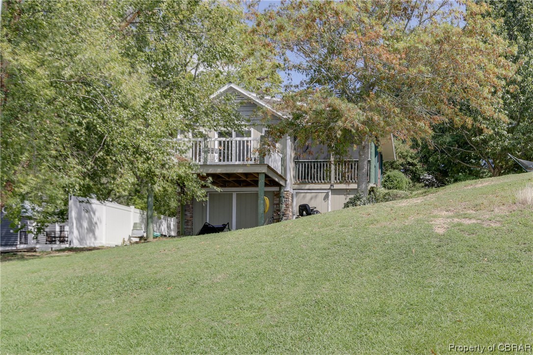 5403 Ark Road Gloucester, VA 23061 - Photo 45 of 50 Lots of storage under the guest cottage.