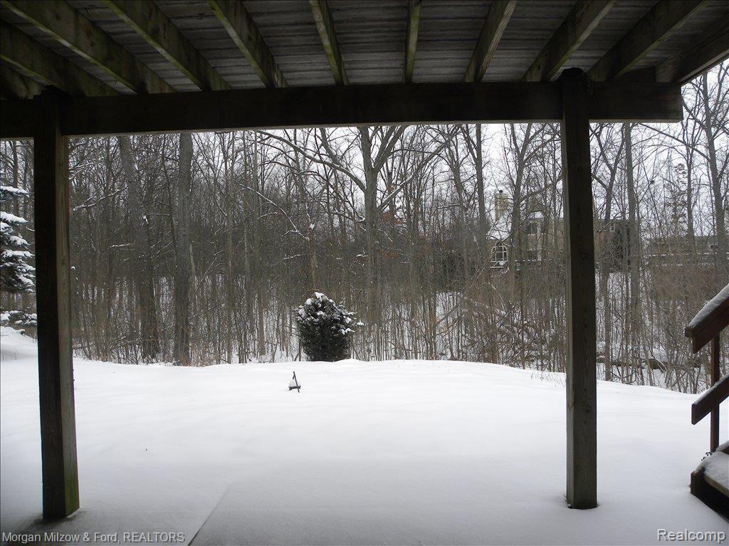 7257 Rabbit Ears Pass, Unit 35 Clarkston, MI 48346 - Photo 3 of 20 Wooded backdrop 2