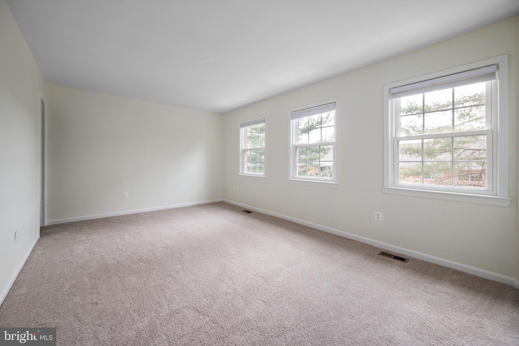 2436 Windbreak Drive Alexandria, VA 22306 - Photo 15 of 36 an empty room with windows