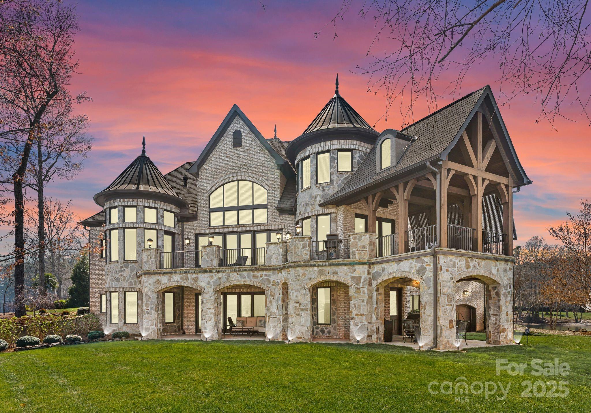 4004 Channel Point Lane Denver, NC 28037 - Photo 1 of 48 a front view of a house with a garden