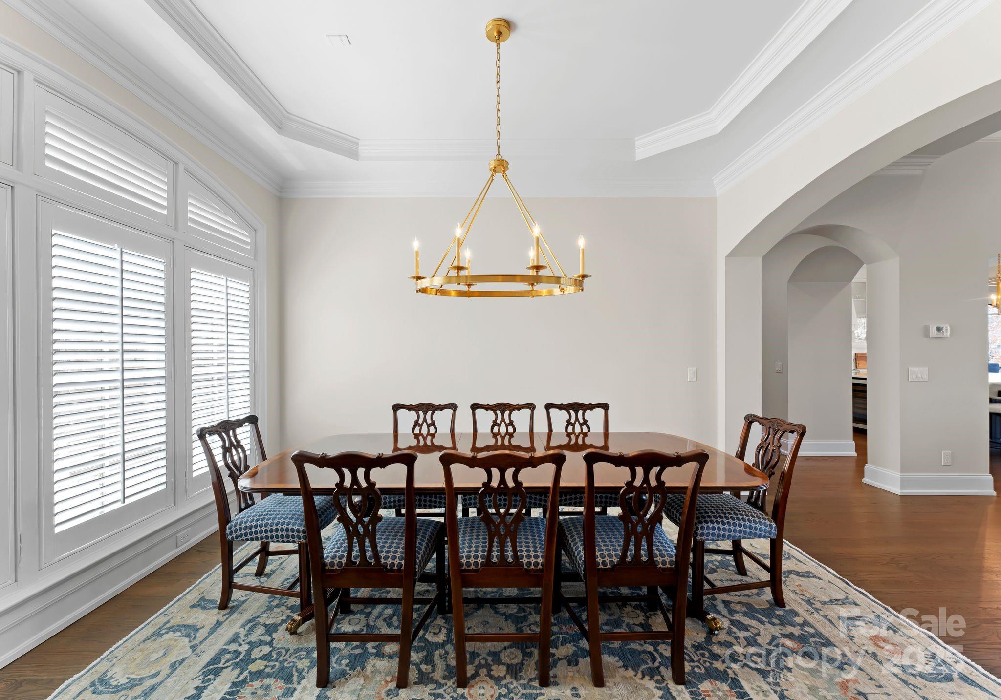 4004 Channel Point Lane Denver, NC 28037 - Photo 14 of 48 a view of a dining room with furniture window and wooden floor