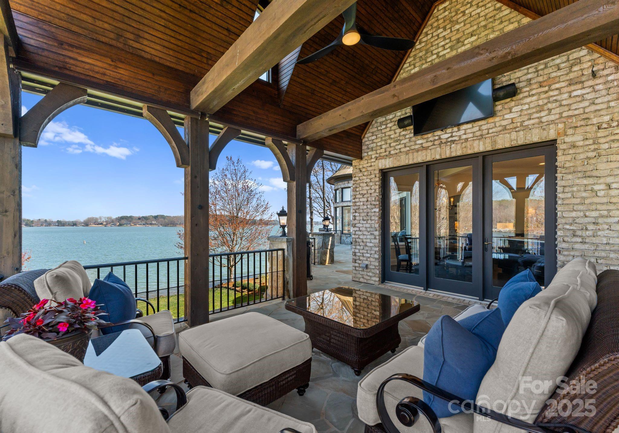 4004 Channel Point Lane Denver, NC 28037 - Photo 18 of 48 a outdoor living space with furniture and a potted plant